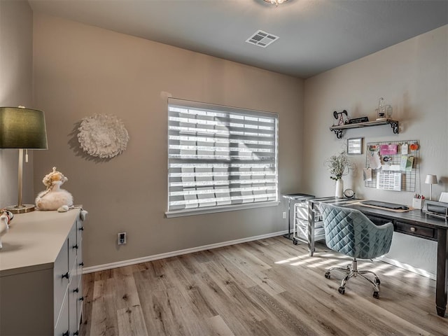 home office featuring light wood-type flooring