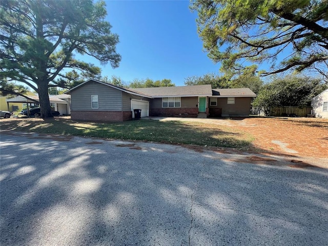 single story home with a garage