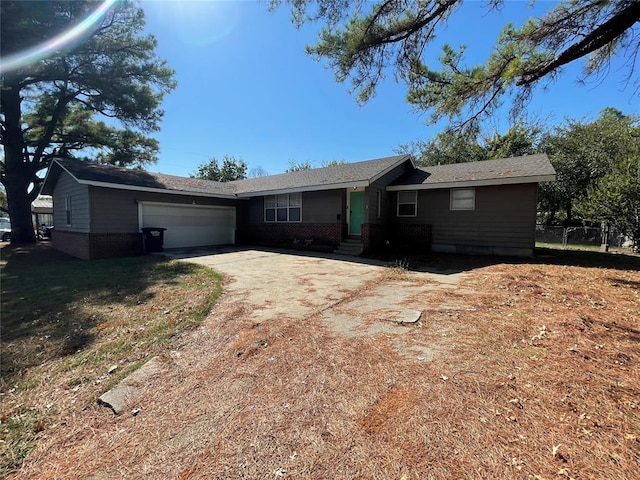 single story home with a garage