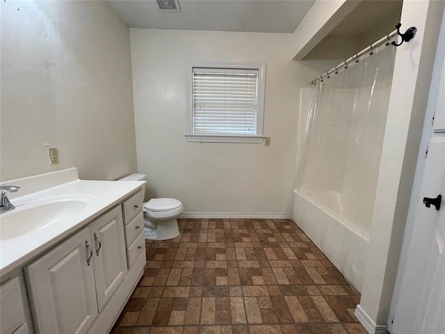 full bathroom with vanity, toilet, and shower / bath combo with shower curtain