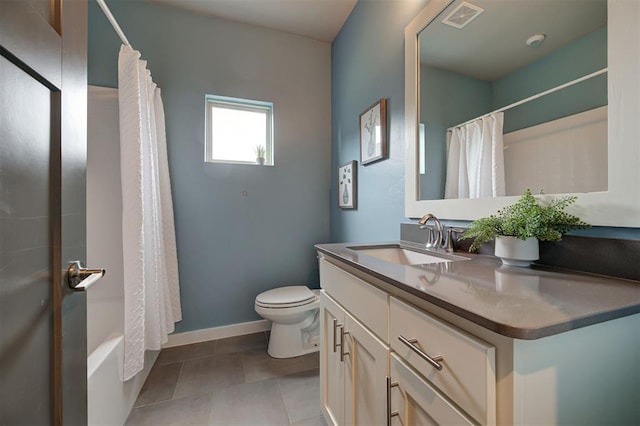 full bathroom with toilet, vanity, shower / bath combo, and tile patterned floors