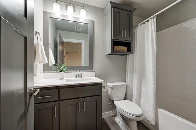 full bathroom featuring toilet, vanity, and shower / bath combination with curtain