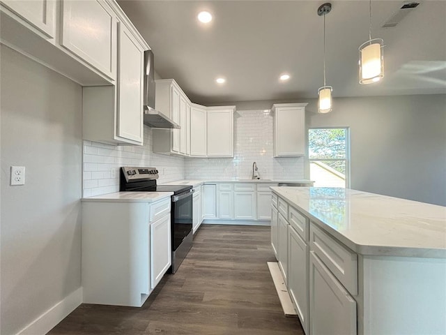 kitchen featuring electric stove, white cabinetry, dark hardwood / wood-style flooring, and pendant lighting