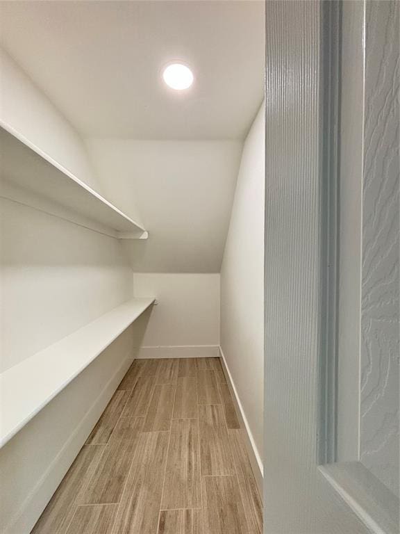 spacious closet with light wood-type flooring