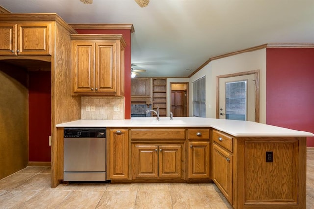 kitchen with dishwasher, decorative backsplash, kitchen peninsula, and sink