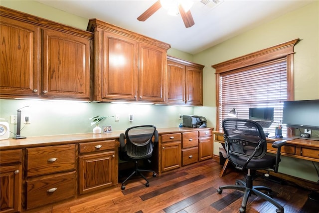 office with dark hardwood / wood-style floors and ceiling fan