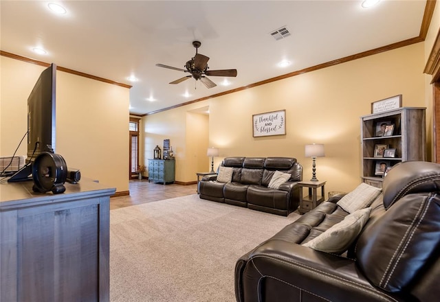 living room with light colored carpet, ceiling fan, and crown molding