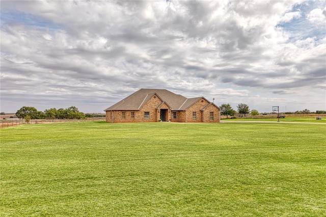 single story home with a front yard