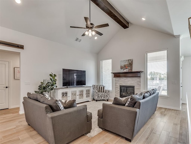 1718 Zayden Ln, Norman, OK 73072 - living room with ceiling fan, light hardwood / wood-style floors, a fireplace, and high vaulted ceiling