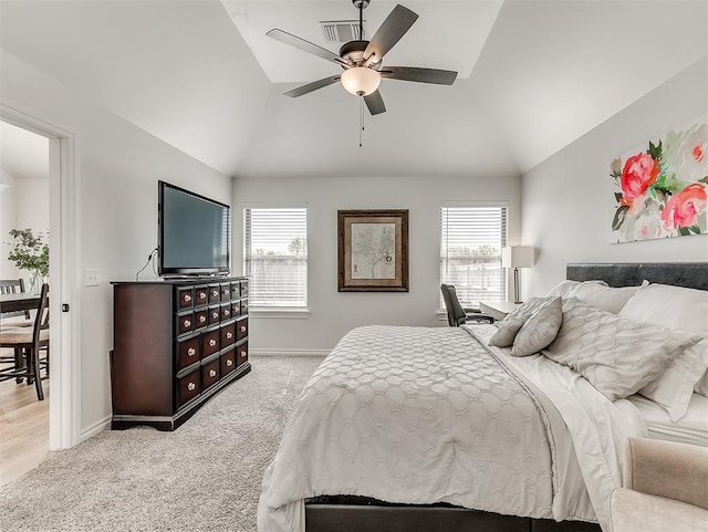 1718 Zayden Ln, Norman, OK 73072 - carpeted bedroom with ceiling fan, lofted ceiling, and multiple windows