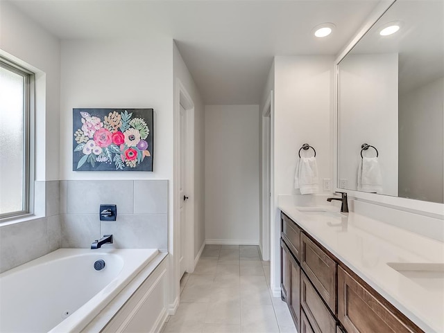 1718 Zayden Ln, Norman, OK 73072 - bathroom featuring a tub to relax in, tile patterned flooring, and vanity
