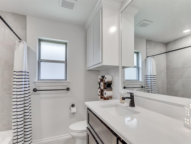 1718 Zayden Ln, Norman, OK 73072 - bathroom with vanity, toilet, and a wealth of natural light