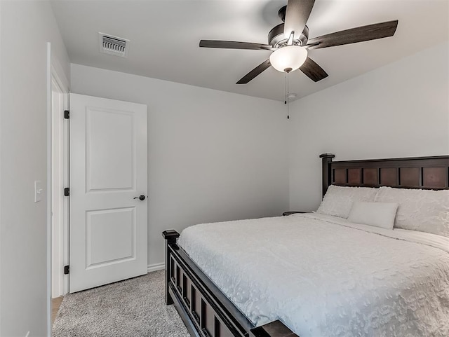 1718 Zayden Ln, Norman, OK 73072 - carpeted bedroom with ceiling fan