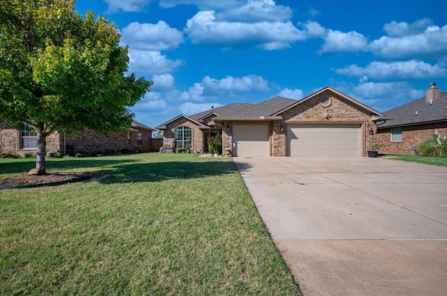 ranch-style house featuring a garage and a front lawn