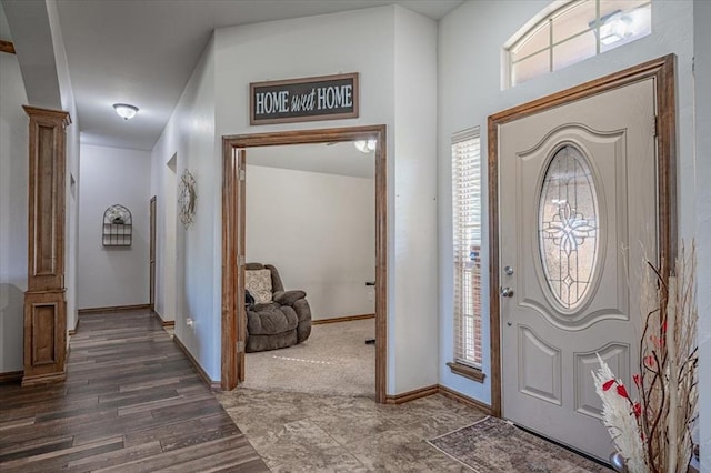 entryway with dark wood-type flooring