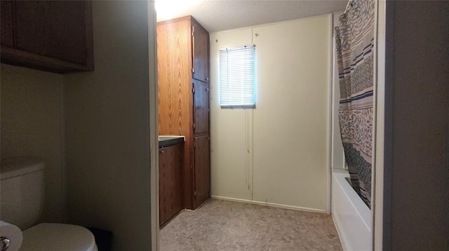 full bathroom with vanity, toilet, and shower / bathtub combination with curtain