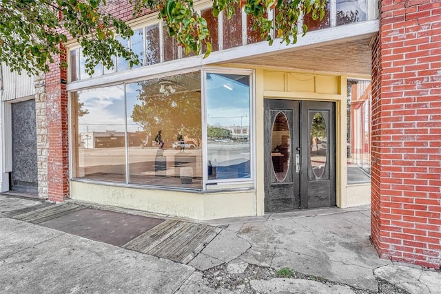 entrance to property featuring french doors