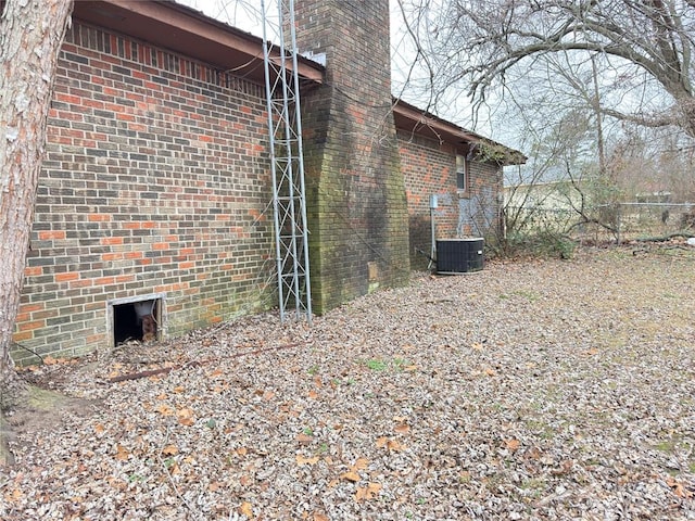 view of home's exterior featuring central AC