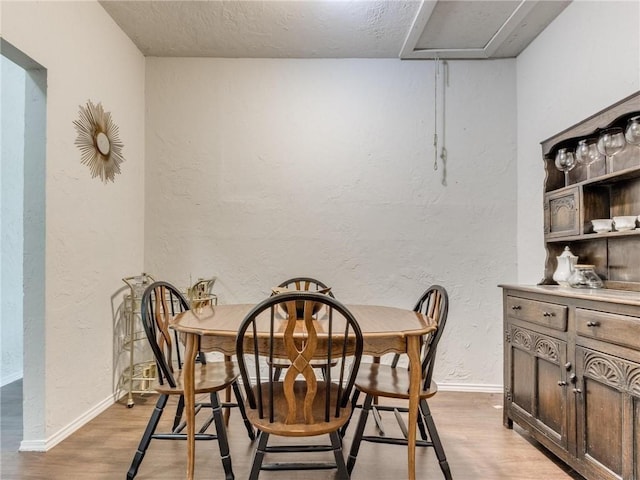 dining area featuring light hardwood / wood-style floors