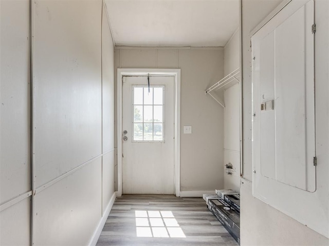 washroom with light wood-type flooring