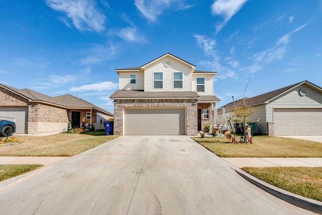 view of property featuring a garage and a front lawn