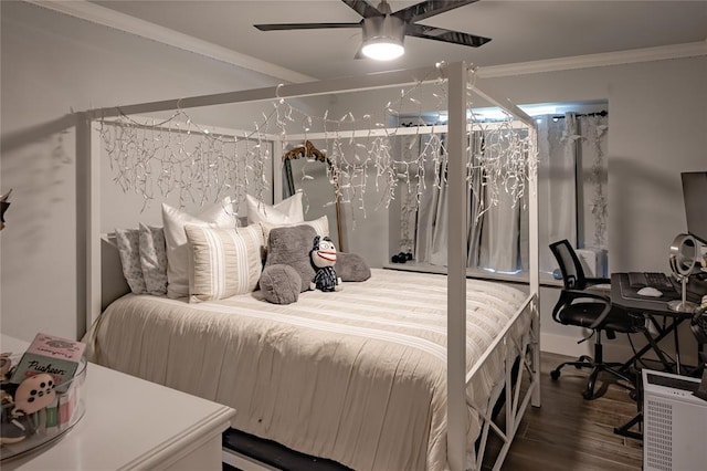 bedroom featuring ceiling fan, ornamental molding, and hardwood / wood-style flooring