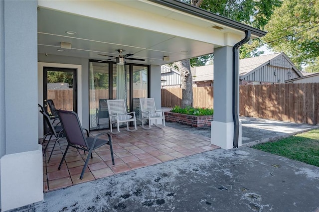 view of patio featuring ceiling fan