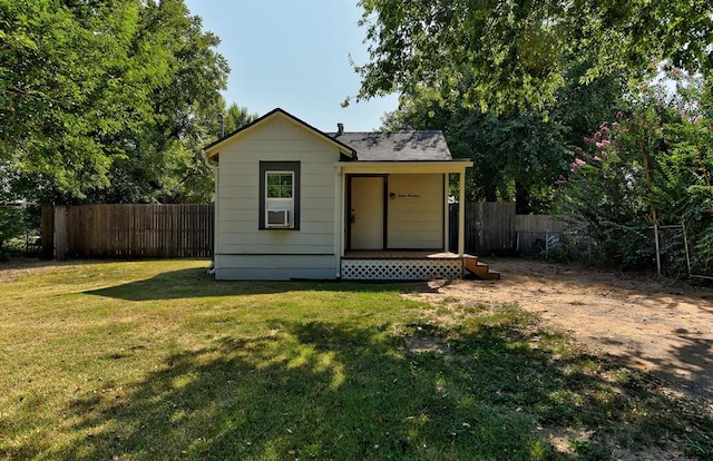 view of outdoor structure featuring a yard