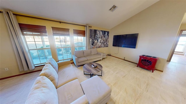 living room with lofted ceiling