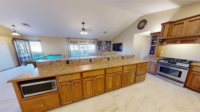 kitchen with stainless steel appliances, hanging light fixtures, lofted ceiling, and billiards