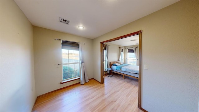 unfurnished bedroom featuring light hardwood / wood-style floors