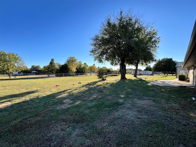 view of yard featuring central AC