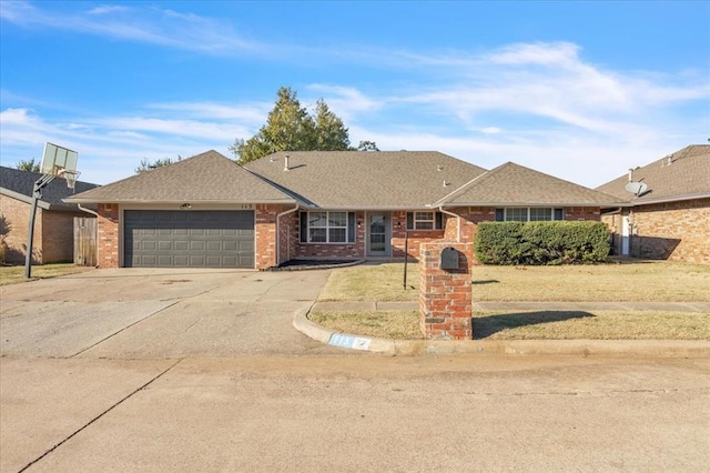 ranch-style house featuring a garage