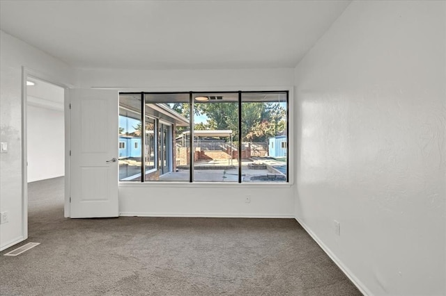 empty room featuring carpet