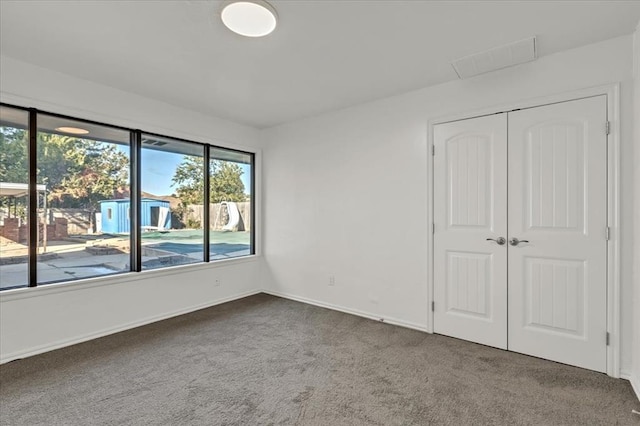 view of carpeted spare room