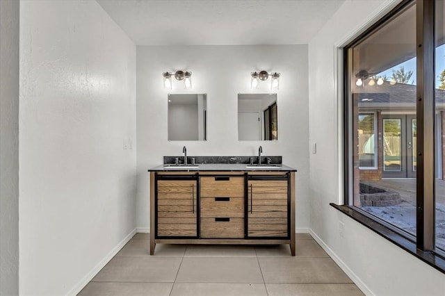 bathroom featuring tile patterned floors and vanity