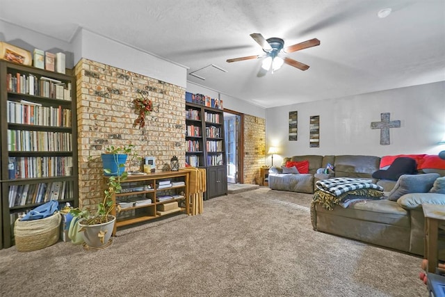 living area with carpet flooring and ceiling fan