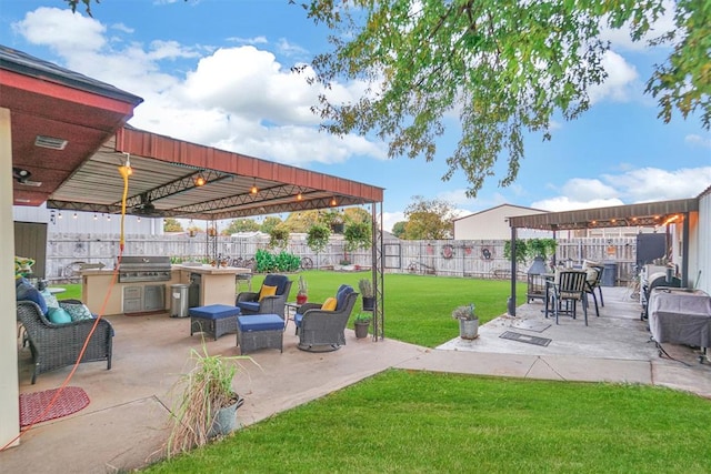 view of patio / terrace featuring outdoor lounge area, exterior kitchen, area for grilling, and a pergola