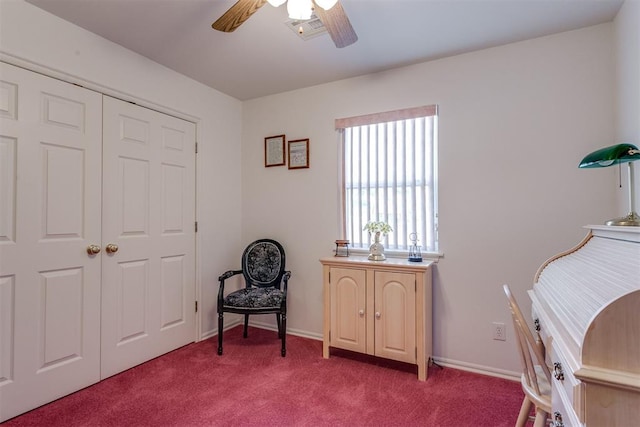 living area featuring ceiling fan and light colored carpet