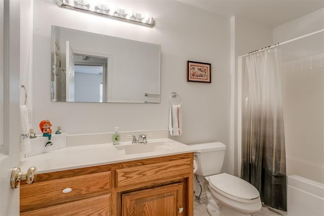 full bathroom featuring shower / bath combo, vanity, and toilet