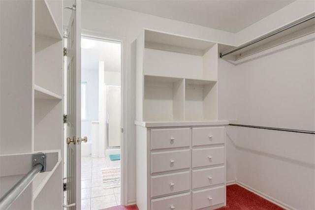 walk in closet featuring tile patterned floors