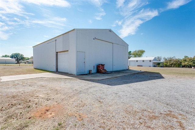 view of outbuilding featuring a garage