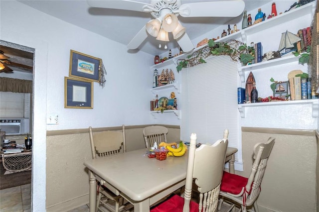 dining room with tile patterned flooring