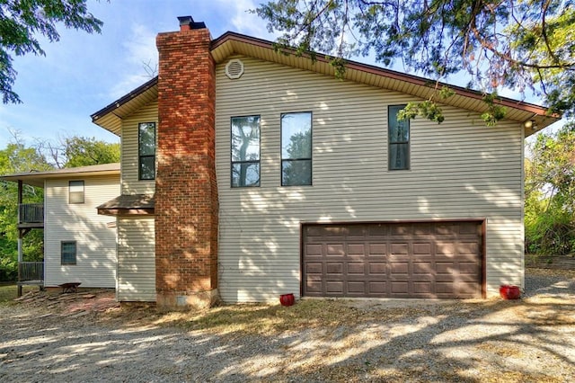 view of home's exterior with a garage