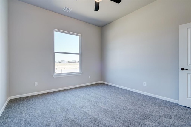 carpeted empty room with ceiling fan