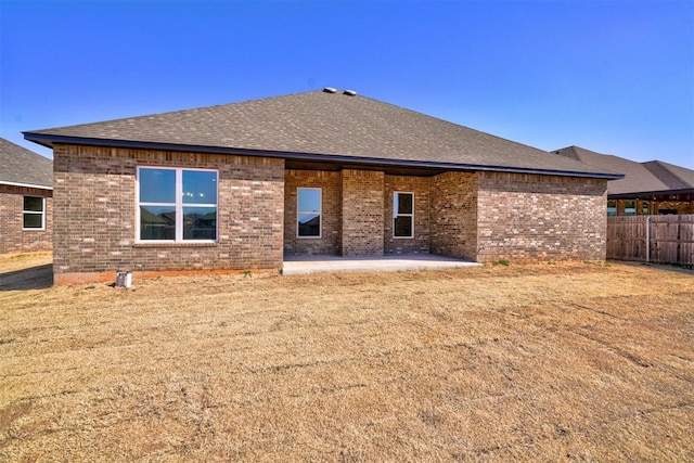 back of property with a patio area