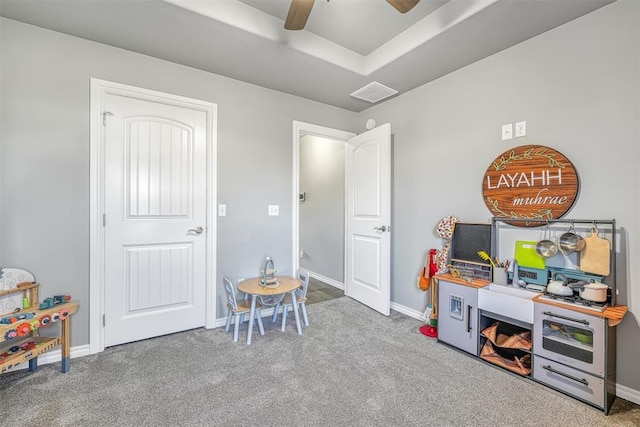 game room featuring carpet and ceiling fan