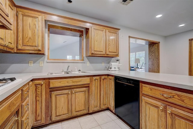 kitchen featuring sink, light tile patterned floors, black dishwasher, and vaulted ceiling