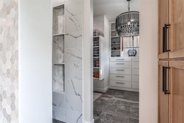 bathroom featuring a chandelier