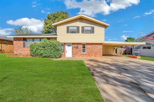 view of front of property with a front yard and a carport